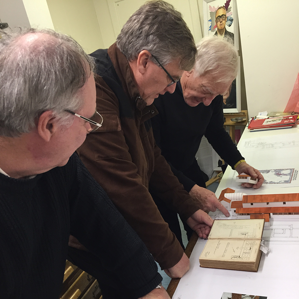 archaeologists and Mike Perry discussing details of Folkestone's Roman Villa